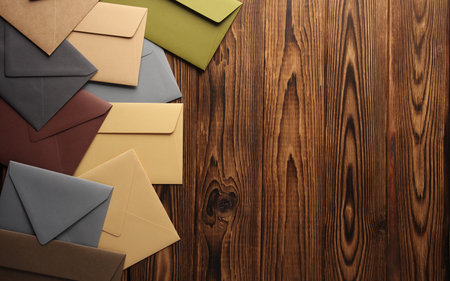 Creative layout of colored envelopes on wooden boards