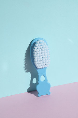 Children's brush on a blue-pink background