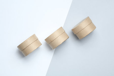 Round craft cardboard boxes for product on white gray backgroundの写真素材