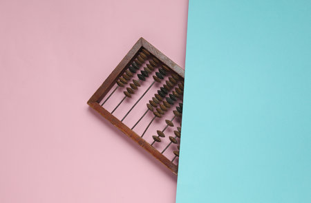 Retro wooden abacus on blue pink backgroundの写真素材