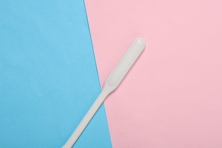 Flexible USB lamp on a blue-pink backgroundの写真素材