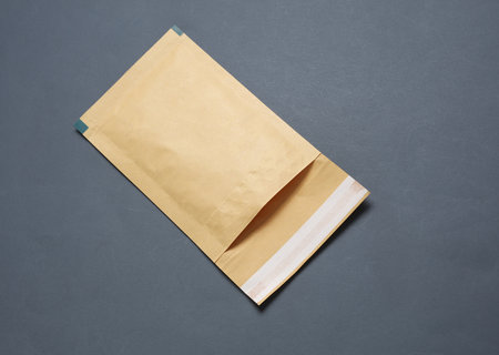 Shipping Post Parcel Envelope on Dark Gray Background