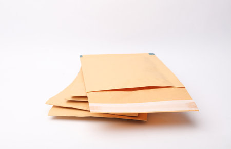 Shipping Post Parcel Envelopes on white Backgroundの写真素材