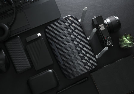 Modern black gadgets and accessories Laptop, camera, smartphone, external hard drive, wi fi router,...