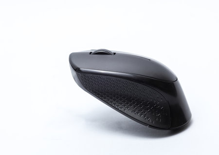 Floating black pc mouse on white background