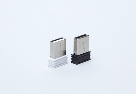Two mini USB flash drives on a white backgroundの写真素材