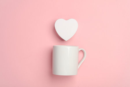 Ceramic cup with heart on pink background. Valentine's day conceptの写真素材
