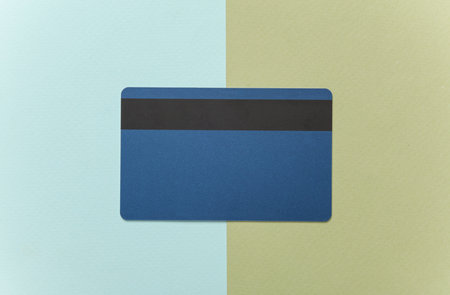 Plastic Bank card on a blue-green backgroundの写真素材