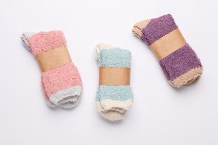 New socks with wrapped tags on white backgroundの写真素材
