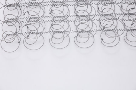 Bed springs on white background close upの写真素材