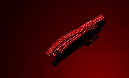 Hairpin with precious stones in red neon lightの写真素材