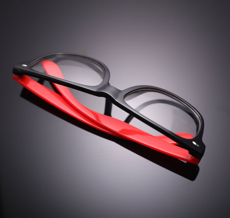 Stylish fashion eyeglasses on black background.の写真素材