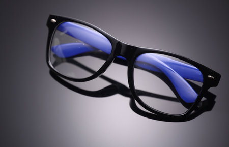 Stylish fashion eyeglasses on black background.の写真素材