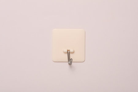 Wall hook on a beige backgroundの写真素材