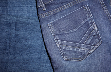 Texture of blue jeans pants close upの写真素材