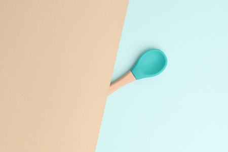 Eco baby spoon on pastel backgroundの写真素材