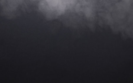 Steam or smoke on a black background. Copy spaceの写真素材