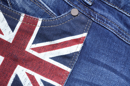 Blue jeans with britain flag closeupの写真素材