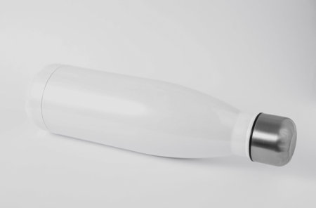 Mockup of white thermo bottle on white backgroundの写真素材