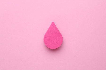 Pink Makeup Sponge on Pastel Backgroundの写真素材