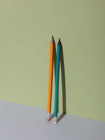Stationery pencils on a green backgroundの写真素材