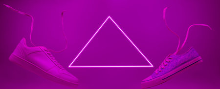Sneakers shoes with flying laces. Violet neon triangle. Retro futurism. 1980s