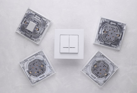 Light Switches on a Grey Concrete background