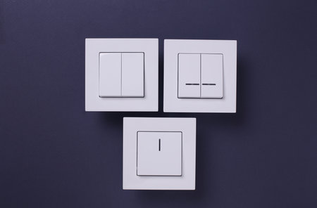 Light Switches on dark blue Background. Top view