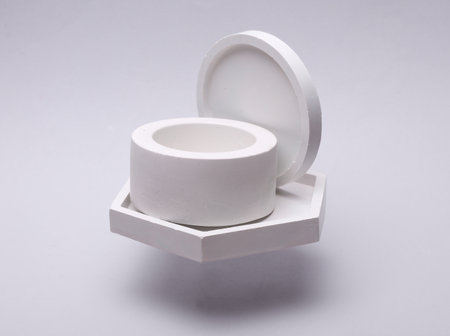 White Plaster Trays Floating on Gray Backgroundの写真素材