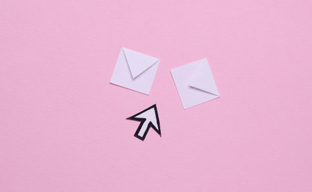 Cursor with letters on pink backgroundの写真素材