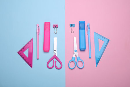 School stationery on pink blue background. Flat lay. Creative layoutの写真素材