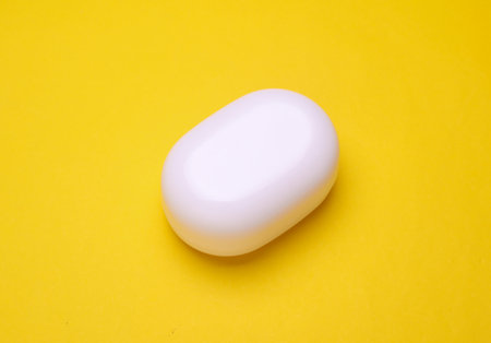 Soap dish on a yellow backgroundの写真素材