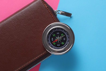 Purse and compass on white background. Business concept