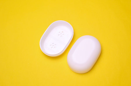 Soap dish on a yellow backgroundの写真素材