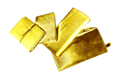 Golden leather wallets isolated on white backgroundの写真素材