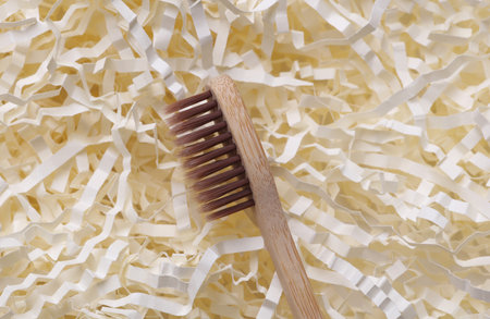 Eco bamboo toothbrush on Paper filler close upの写真素材