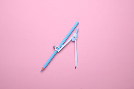 Blue Stationery set on pink pastel background. Back to school, education, office supplies. Flat lay. Top view. Creative layoutの写真素材