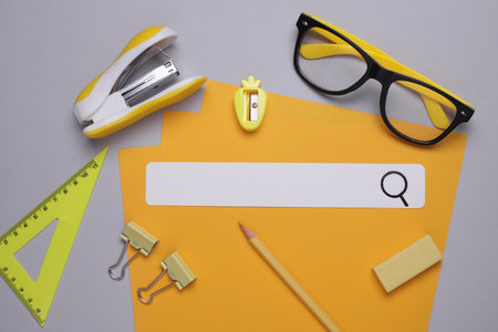 Browser search bar and stationery on gray backgroundの写真素材