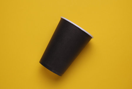 Black disposable cup for hot drinksの写真素材