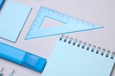 Blue Stationery set on gray background. Back to school, education, office supplies. Flat lay. Top view. Creative layoutの写真素材