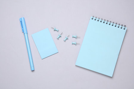 Blue Stationery set on gray background. Back to school, education, office supplies. Flat lay. Top view. Creative layoutの写真素材