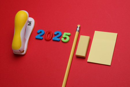 Stationery set with 2025 year on red backgroundの写真素材