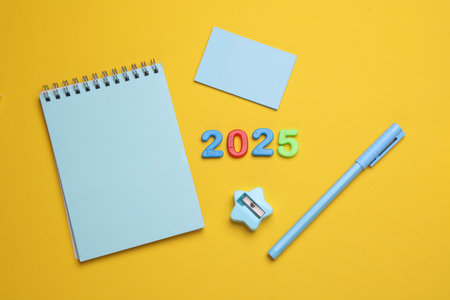 Stationery set with 2025 year on yellow backgroundの写真素材