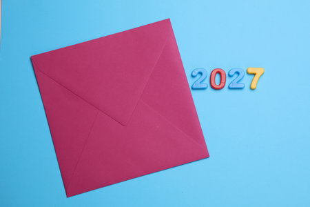 2027 year text with multicolored numbers and envelopeの写真素材