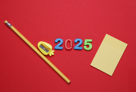 Stationery set with 2025 year on red backgroundの写真素材