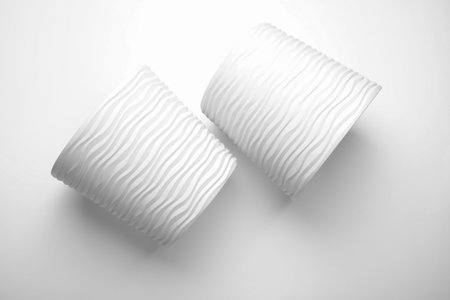 Two plastic flowerpots on white backgroundの写真素材