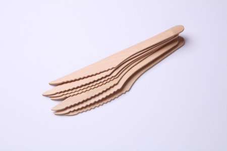 Set of eco wooden knives on white backgroundの写真素材