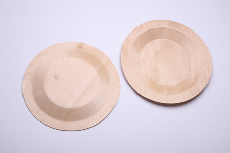 Eco wooden plates on white backgroundの写真素材