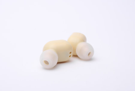 Wireless vacuum headphones on white backgroundの写真素材