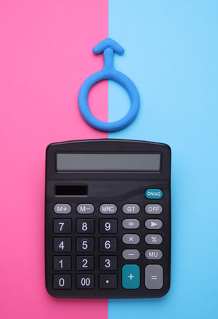 Calculator with male gender symbol on blue pink backgroundの写真素材